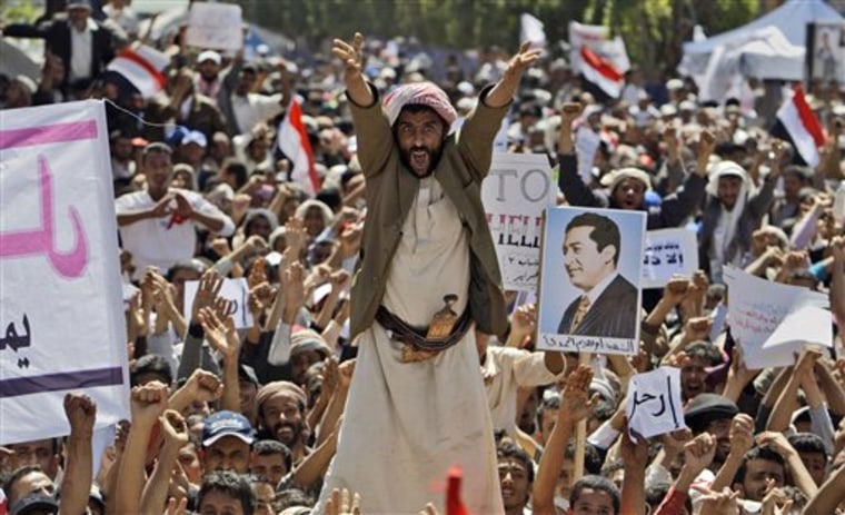 Yemenis shout for the resignation of President Ali Abdullah Saleh during a march Tuesday in Sanaa.